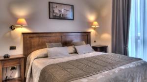 Voodi või voodid majutusasutuse Hotel Belvedere Thiene toas