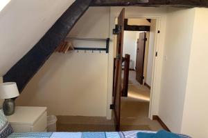 Postel nebo postele na pokoji v ubytování Le Bas Chesnay Gîte Domfront en Poiraie