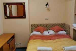 Łóżko lub łóżka w pokoju w obiekcie FAMILIJNY Ośrodek Wypoczynkowo - Rehabilitacyjny Krynica Zdrój