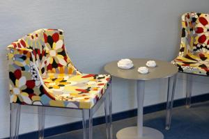 Istumisnurk majutusasutuses Hôtel Le Funi de Cossonay