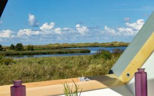 - une vue sur la rivière depuis l'arrière du bateau dans l'établissement Deichkieker Whg 17, à Sankt Peter-Ording