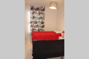 Postel nebo postele na pokoji v ubytování Bonito apartamento en primera línea de campo de golf y vistas al mar + 4 fotografie