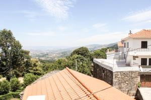 a view from the roof of a house at Casa dos Limos Verdes in Folgosinho
