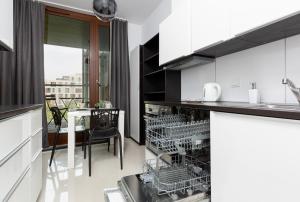 Balkón alebo terasa v ubytovaní 19 Dzielnica Apartamenty Warszawa by Noclegi Renters