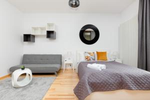 Posteľ alebo postele v izbe v ubytovaní 19 Dzielnica Apartamenty Warszawa by Noclegi Renters + 20 fotografií