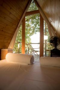 Posteľ alebo postele v izbe v ubytovaní Zagreb Camp Bungalows