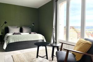 Postel nebo postele na pokoji v ubytování Mon Appart'hôtel - Superbe Studio avec Parking Gratuit
