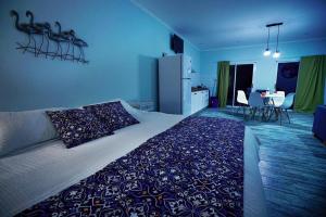 Las Piedritas Casa de Mar Loft tesisinde bir odada yatak veya yataklar