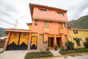 a house with an orange at San Isidro's House in Ollantaytambo