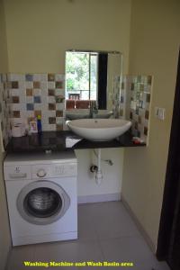 Ванная комната в Mango Apartment @ Palolem Garden Estate