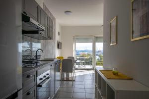 Kuchyňa alebo kuchynka v ubytovaní Apartments Lantina