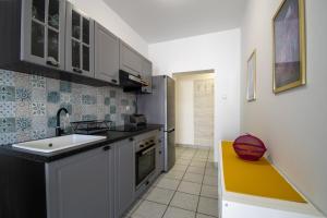 Kuchyňa alebo kuchynka v ubytovaní Apartments Lantina