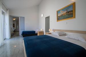 Posteľ alebo postele v izbe v ubytovaní Apartments Lantina