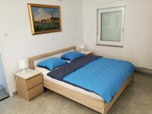 Posteľ alebo postele v izbe v ubytovaní Apartments Lantina