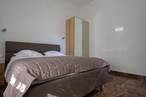 Posteľ alebo postele v izbe v ubytovaní Apartments Lantina