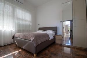 Posteľ alebo postele v izbe v ubytovaní Apartments Lantina