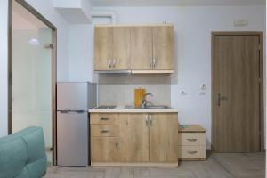 Kuchyň nebo kuchyňský kout v ubytování Hotel Villa Adrian