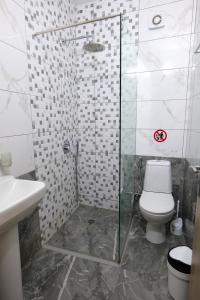 Koupelna v ubytování Hotel Villa Adrian