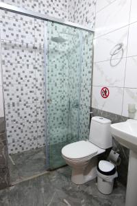 Koupelna v ubytování Hotel Villa Adrian