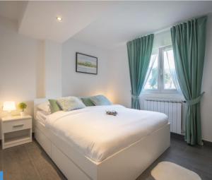 Кровать или кровати в номере Villa Green Oasis