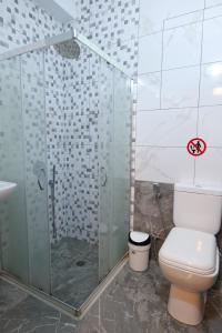 Koupelna v ubytování Hotel Villa Adrian
