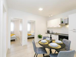 Кухня или мини-кухня в Apartment Aria
