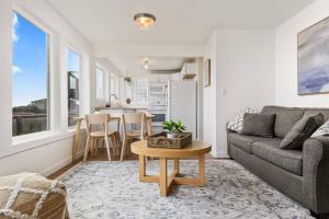 a living room with a couch and a table at Vista House Unit B in Tillamook