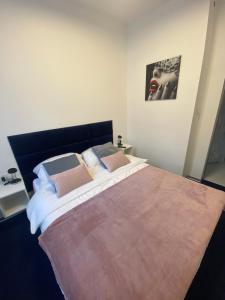 Posteľ alebo postele v izbe v ubytovaní Apartamenty Planeta