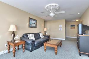 TV a/nebo společenská místnost v ubytování Island Treasure