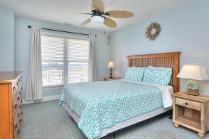 Postel nebo postele na pokoji v ubytování Island Treasure + 48 fotografií