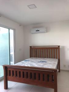 Cama ou camas em um quarto em Lebon Vivant cobertura vista mar