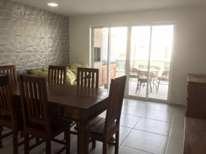 Uma área de estar em Lebon Vivant cobertura vista mar