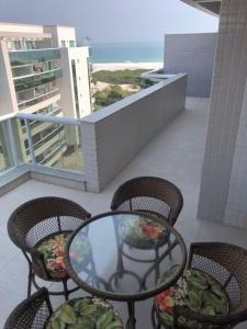 Uma varanda ou terraço em Lebon Vivant cobertura vista mar