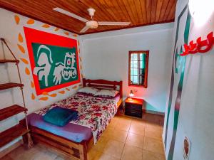 Postel nebo postele na pokoji v ubytování Divanga Hostel and Diving