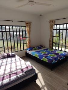 Postel nebo postele na pokoji v ubytování Casa Quinta Villa Sofi & Juanes