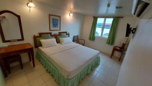 Postel nebo postele na pokoji v ubytování Hotel Johan
