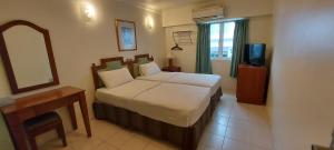 Postel nebo postele na pokoji v ubytování Hotel Johan