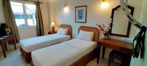 Postel nebo postele na pokoji v ubytování Hotel Johan