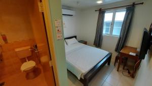 Postel nebo postele na pokoji v ubytování Hotel Johan