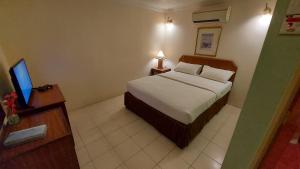 Postel nebo postele na pokoji v ubytování Hotel Johan