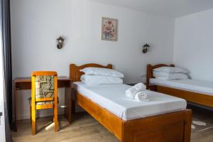 Кровать или кровати в номере Drag de Maramureș