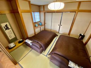 Postel nebo postele na pokoji v ubytování Hotel EL Utsunomiya 7 free parking