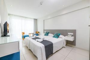 Cama ou camas em um quarto em River Rock Hotel