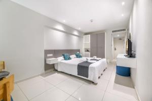Cama ou camas em um quarto em River Rock Hotel