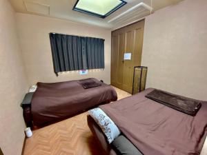 Postel nebo postele na pokoji v ubytování Hotel EL Utsunomiya 7 free parking