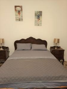 Uma cama ou camas num quarto em Villa Mosta