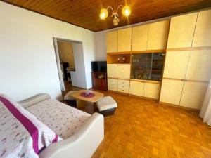 Postel nebo postele na pokoji v ubytování Apartman Renči
