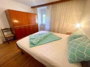 Postel nebo postele na pokoji v ubytování Apartman Renči