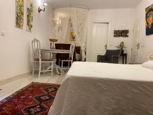 Postel nebo postele na pokoji v ubytování Casa de David
