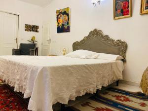 Postel nebo postele na pokoji v ubytování Casa de David